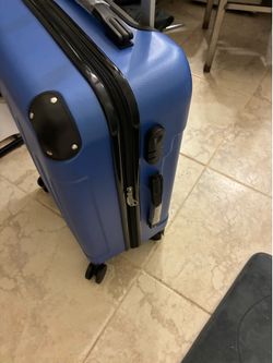 20” blue rolling suitcase