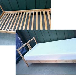 Ikea Twin size wooden bed and Memory Foam mattress both  in excellent condition! Free delivery!