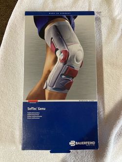 Left knee hinged stability brace