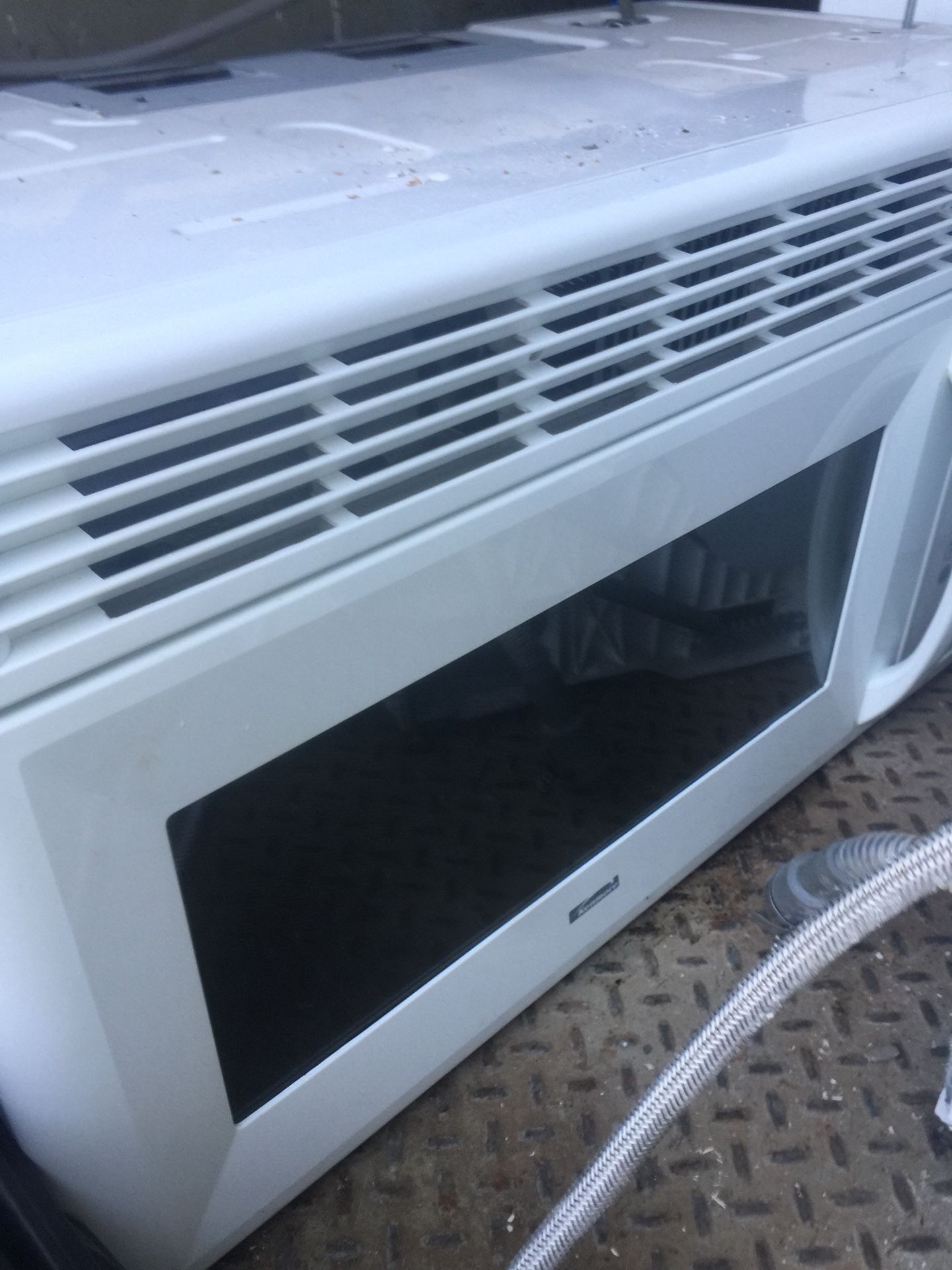 Over the stove WHITE KENMORE microwave $100