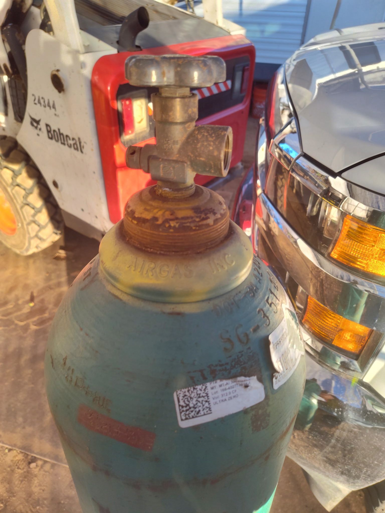 Compressed gas cylinder.