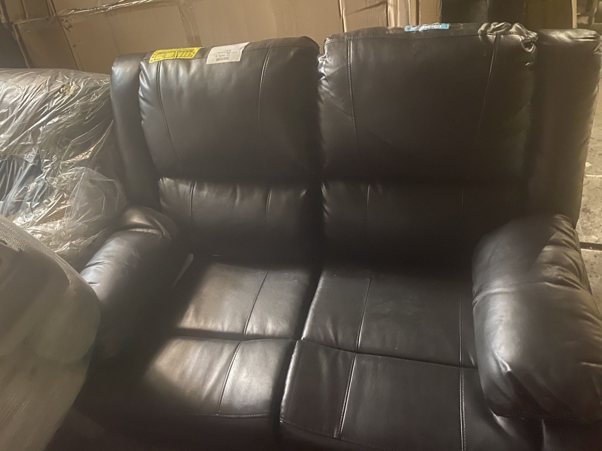 Leather Reclining Love Seat