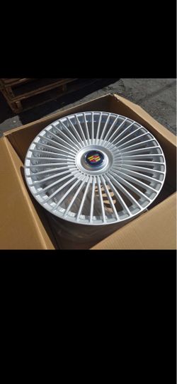 Cadillac Escalade 24” new monsory style silver rims with tires plus floating caps