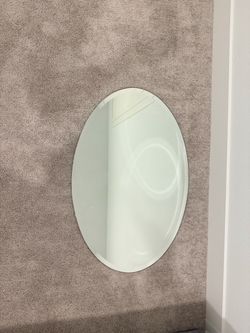 Oval Frameless Beveled Wall Mirror