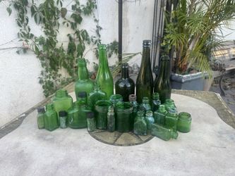 Antique green bottles -20$