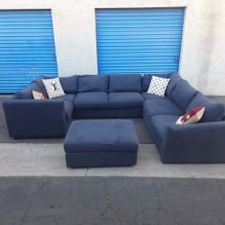 Beautiful sectional couch gray with ottoman, very nice