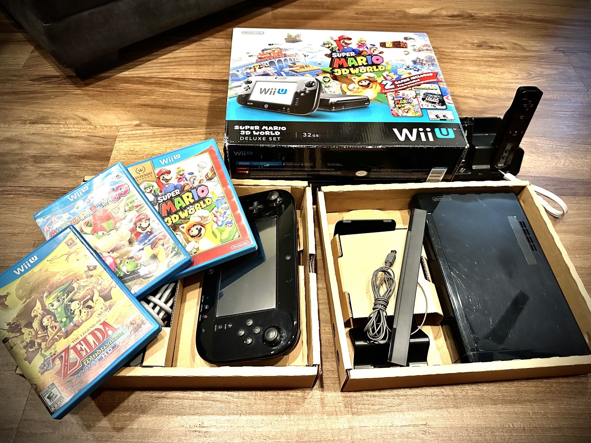 Nintendo WiiU Deluxe Console With 3 Videogames Zelda WindWaker, Super Mario 3D Worlds, And Mario Party 10