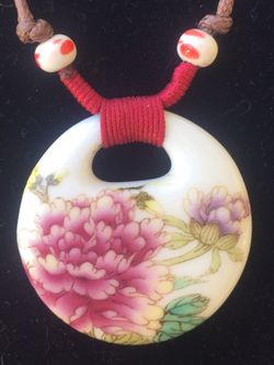 Ceramic painted pink & purple flowers on adjustable brown cord