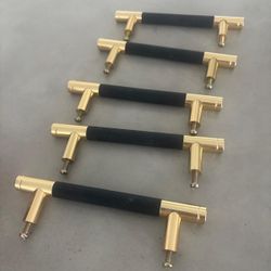 5 drawers handles  with leather grip in the middle .. 4” bet screws.. $30 for all