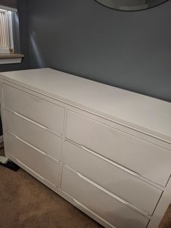 2 White dressers and PotteryBarn twin bed frame