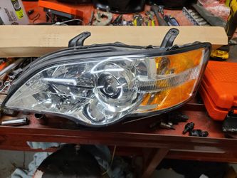 Brand new subaru left headlight outback