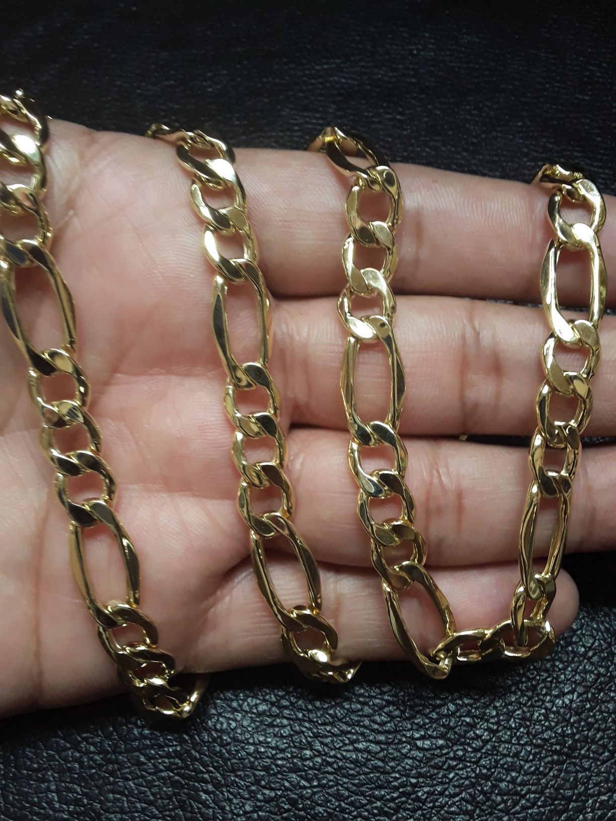 14k gold Figaro chain 26" long we finance