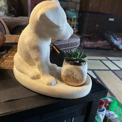 8.5”x11”x6” Resin Dog W/artificial Succulent. 