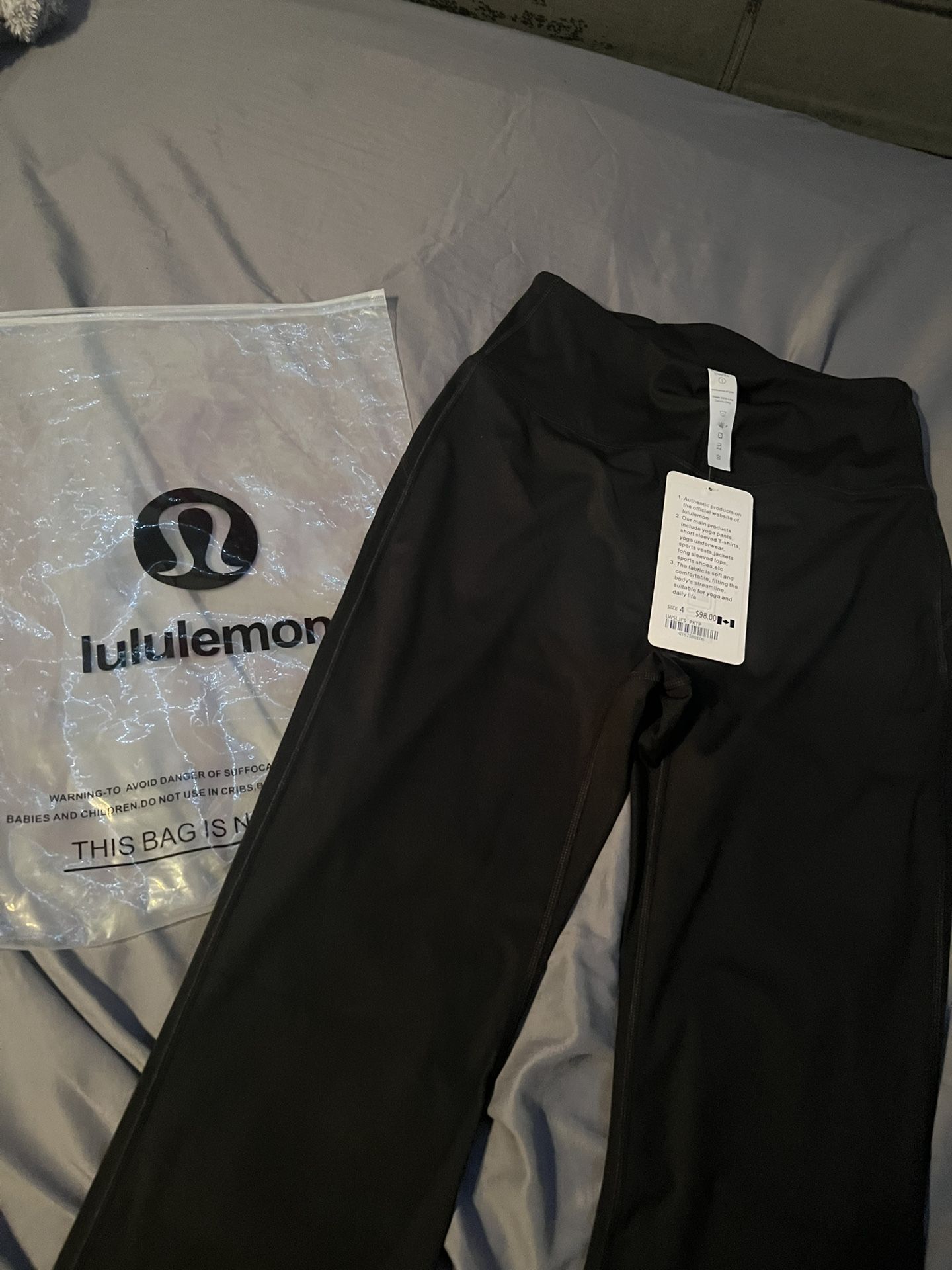 Size 4 Black Lululemon Flared Pants/Leggings
