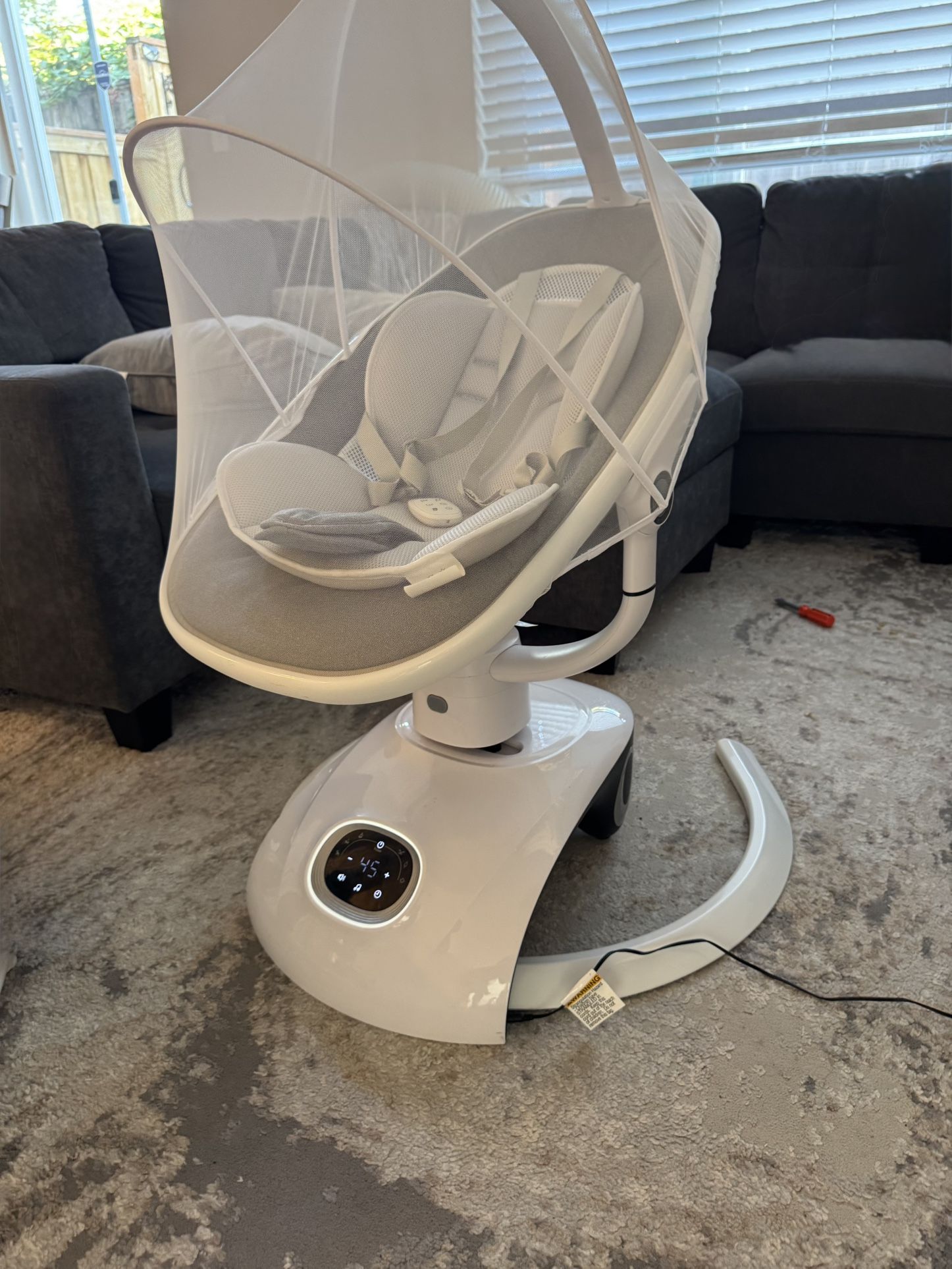 Columpio eléctrico para bebés