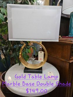 Lamp Marble base Gold Table lampWe are located at 2811 East Bell road. Another Time Around Furniture.