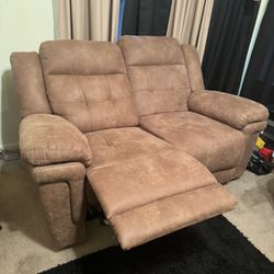 two matching recliner couches