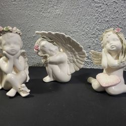 Set Of 3 Vintage Ceramic Angel Figurines WithbFloral Headress And - Rose, Bird And Hear