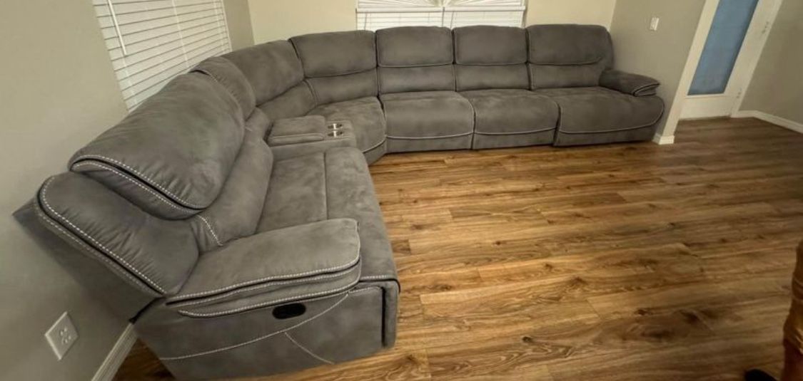 Going out of business sale. Alejandra gray reclining sectional now $1599. Easy finance option. Same day delivery.