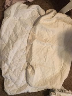 Crib fitted protectors.