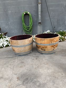 Wine barrels planters available for sale $40 each