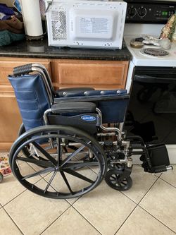 Upright walker and wheelchair