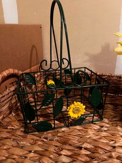 Basket, napkin holder, floral and utensils bucket.