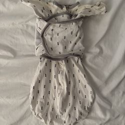 $5 SwaddleDesigns Omni Swaddle Sack featuring a white fabric with a black triangular pattern