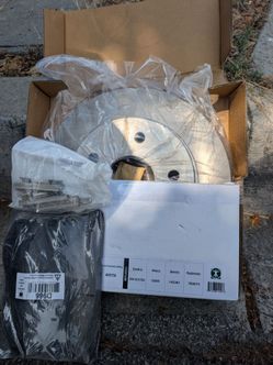Brand new pair of front disc rotors along with new brake pads with hardware