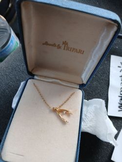 ChangeWishbone necklace with a diamond list 45 hundred and forty nine dollars