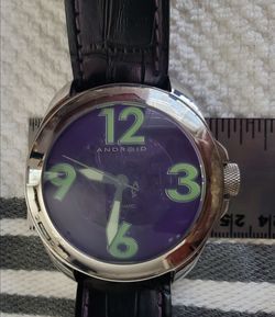 VINTAGE ANDROID AUTOMATIC WRISTWATCH SKELETON FACE AND ESCAPEMENT BACK