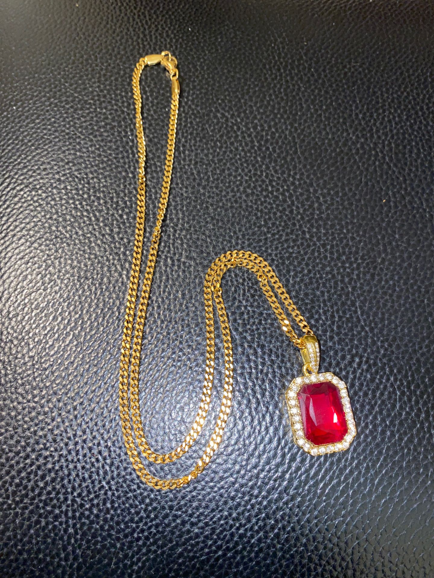 Stainless steel gold chain with red gem