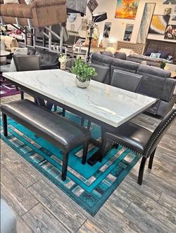 6- Pieces Black color top marble dining set