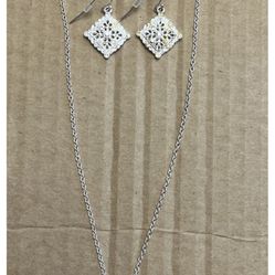  Silver toned necklace and earrings set