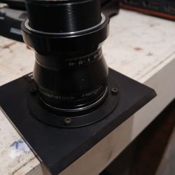 Camera lens with attachment