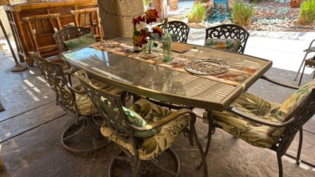 Large patio set glass top table and 6 chairs 2 swivel