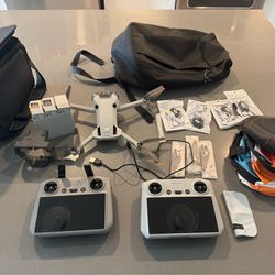 Dji Mini 4 Pro w/ 2 smart controllers and 3 battery bank.