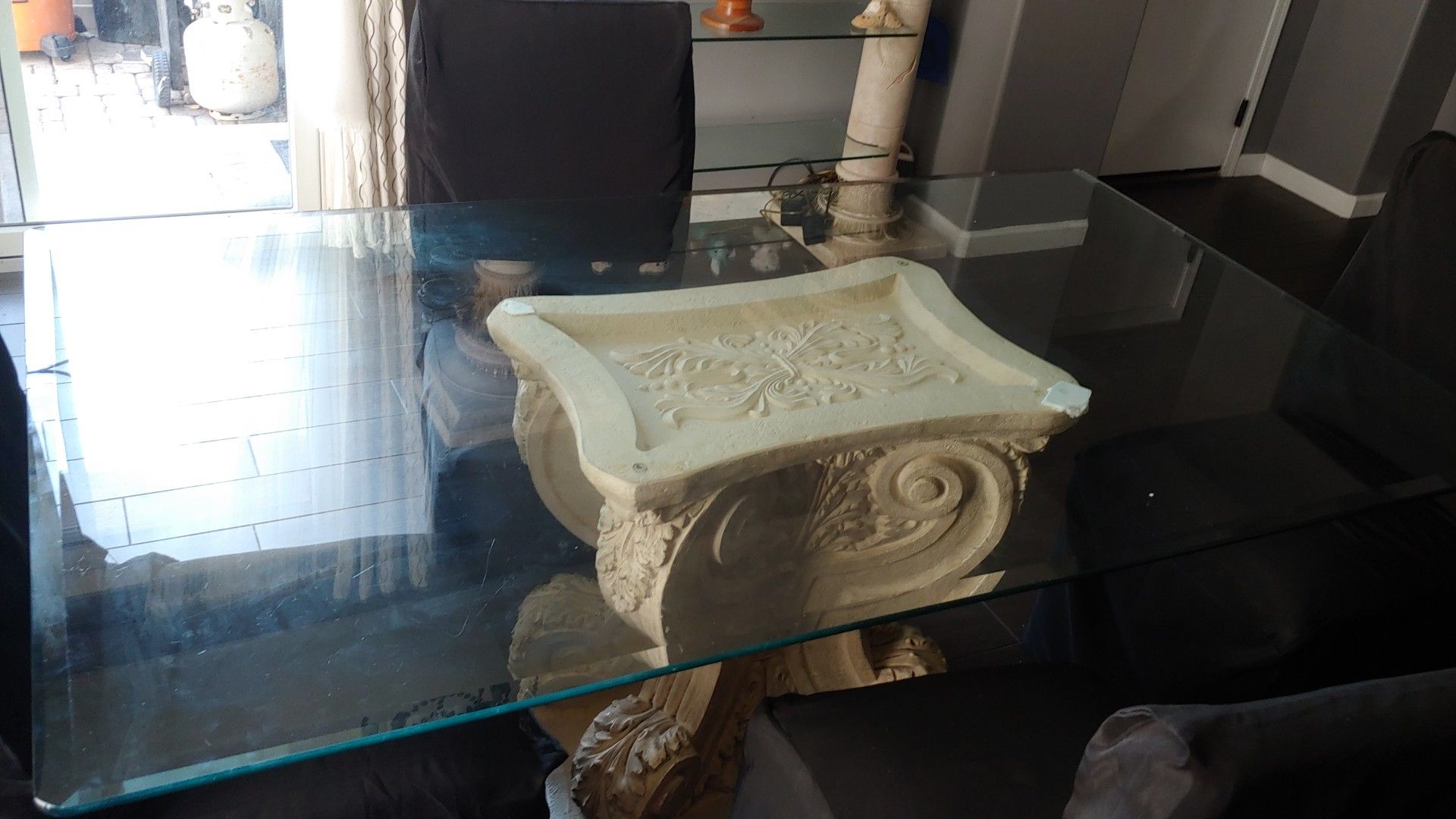 Glass table and chairs and glass shelves