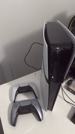 PlayStation 5 pro Console with Two Controllers