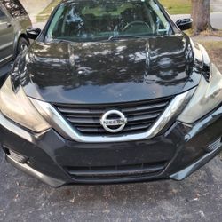 16 Nissan Altima  TRADE for truck 