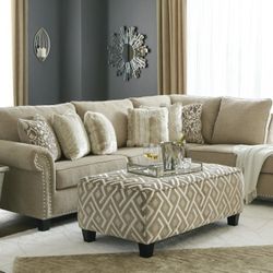 Dovemont Putty Ottoman And RAF Sectional 
