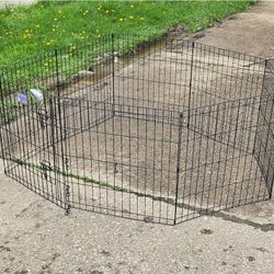 Black E Coat exercise foldup metal pen 
(pets or children) 
24 W x 24 H" 61 W x 61 H  cm. 8 panels. a door is included. Hardware is included.