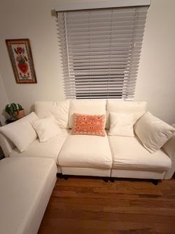BRAND NEW MODULAR SOFA AND OTTOMAN