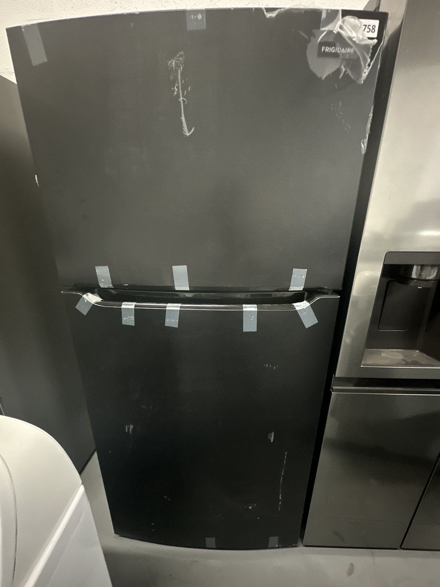New Frigidaire refrigerator In Perfect Condition With Warranty
