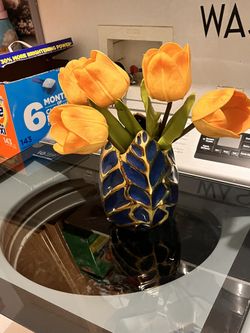 Blue & Gold Vase With Yellow Flowers $8