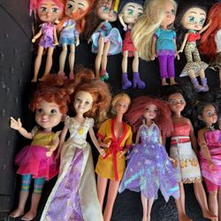 Five (5)  Barbie's With Costumes For Only $20.00