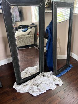 2 mirrors with suede trim