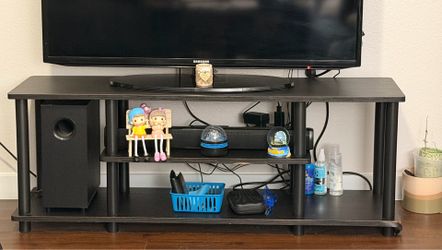 Black TV Stand / Entertainment Center – Good Condition