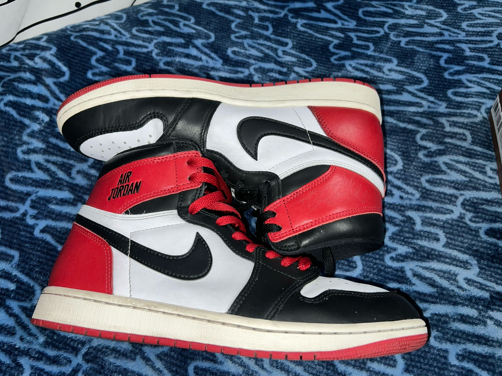 Jordan 1 Retro High OG Black Toe Reimagined