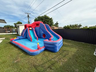 Sunny &Fun Deluxe Adventure Water Park slightly used. Has motor and all  water tubes for water canon and slides $650 or best offer